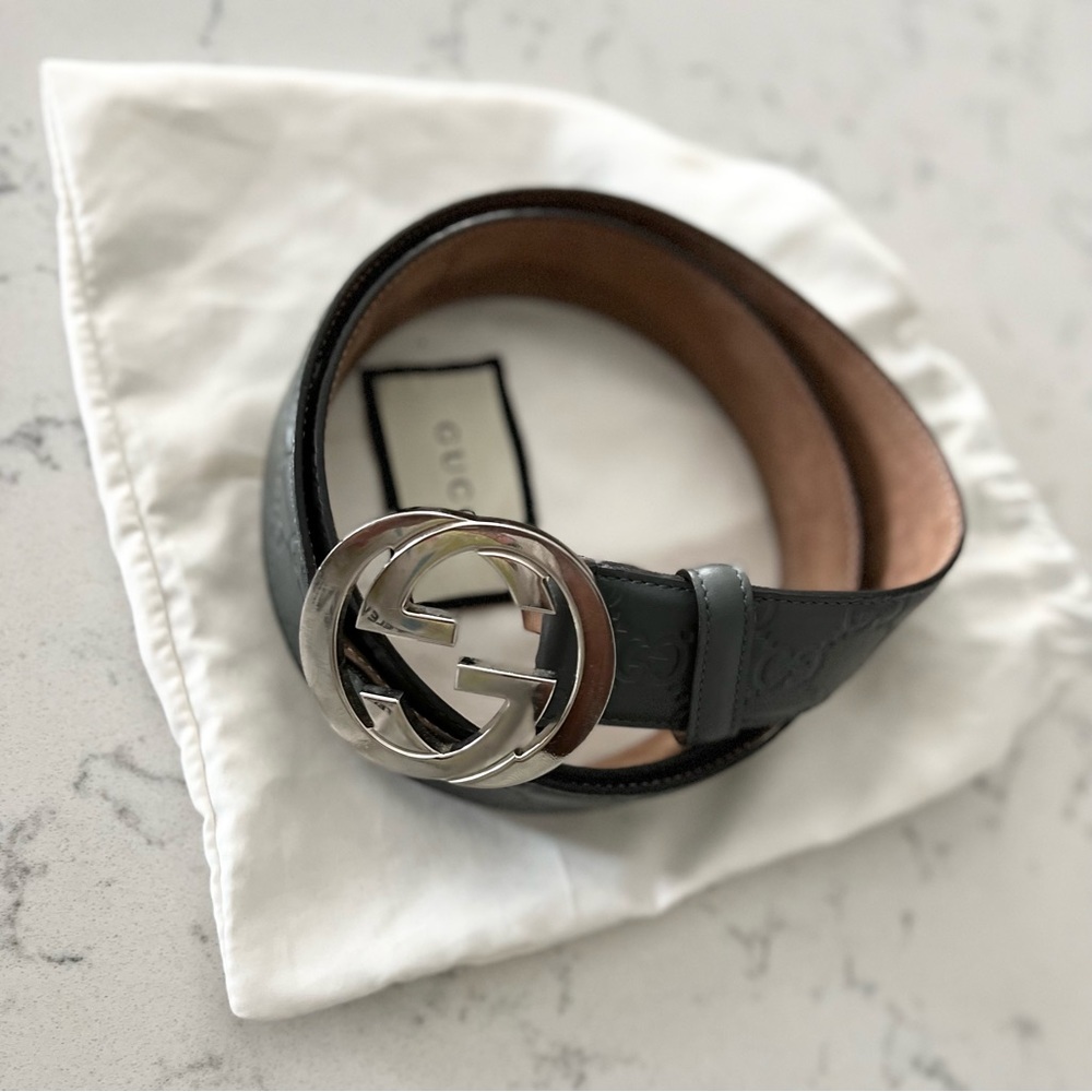 Silver and gray Gucci belt